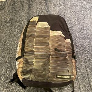 Spray ground backpack money stacks
